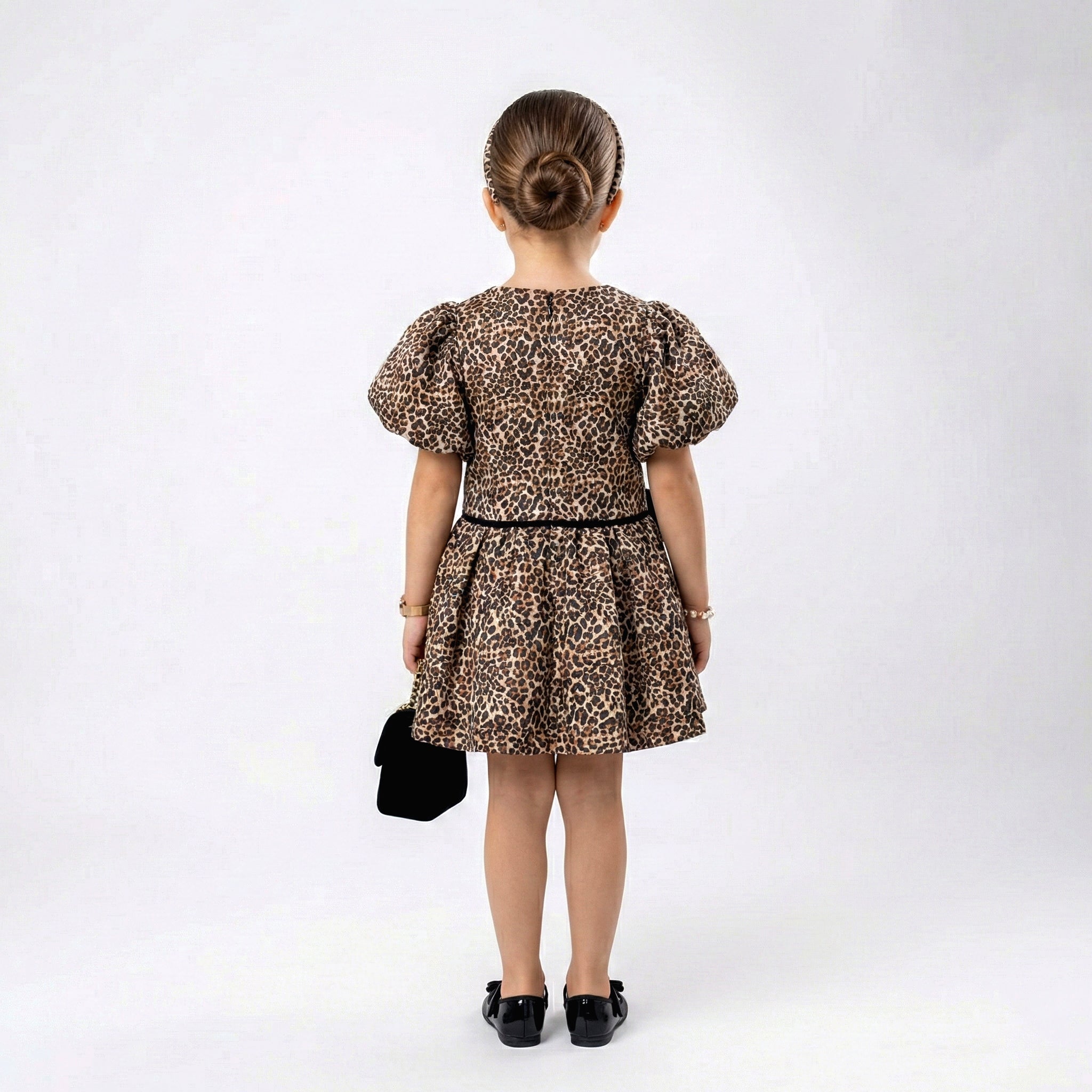Girls Statement Leopard Dress – Elegant Party Wear with Floral Accent