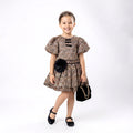Girls Statement Leopard Dress – Elegant Party Wear with Floral Accent